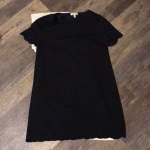 Navy Dress with scalloping on arms and the bottom